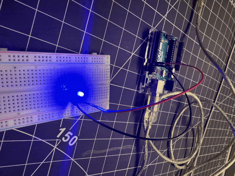 Connecting an external LED to pin 13 and GND. The blue LED on the breadboard is blinking according to the program.